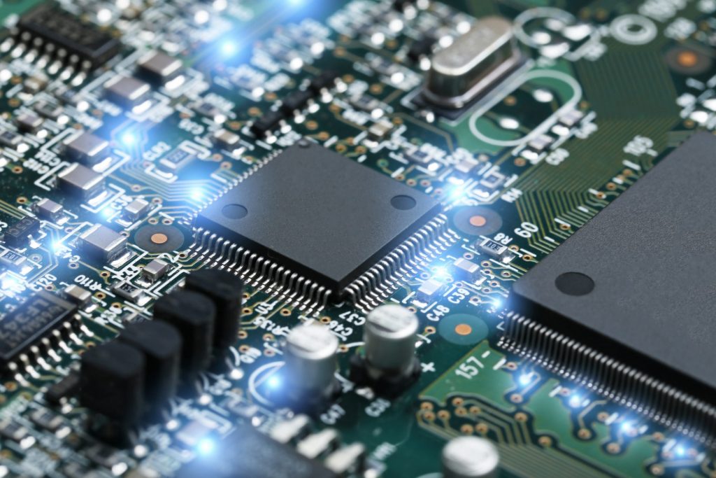 closeup-of-electronic-circuit-board-with-cpu-microchip-electronic-components-background